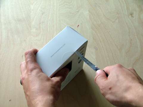 Cutting open the iRiver clix package