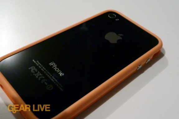Back of iPhone 4 in orange bumper case
