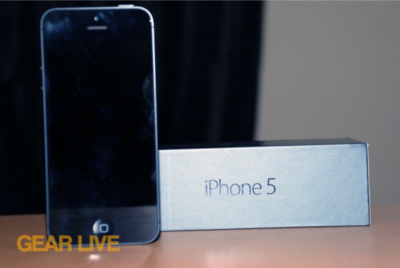 iPhone 5 black & slate standing next to box