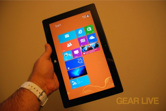 Holding Microsoft Surface in tablet mode