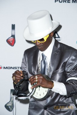 Flava Flav signing Monster DNA White Tuxedo headphones