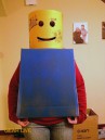 Trying on Supergirl LEGO Superhero Halloween costumes