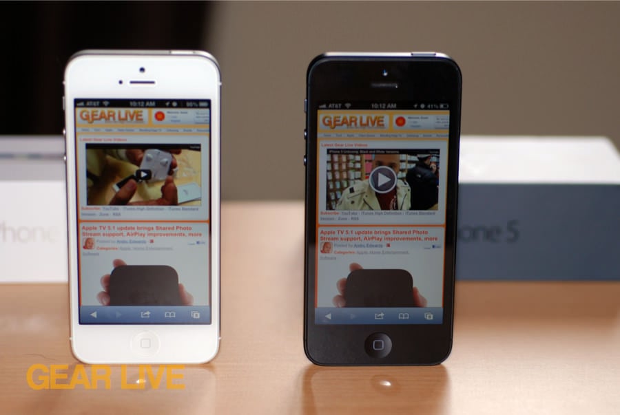Black & White iPhone 5 standing next to each other Black & White iPhone 5 standing next to each other
