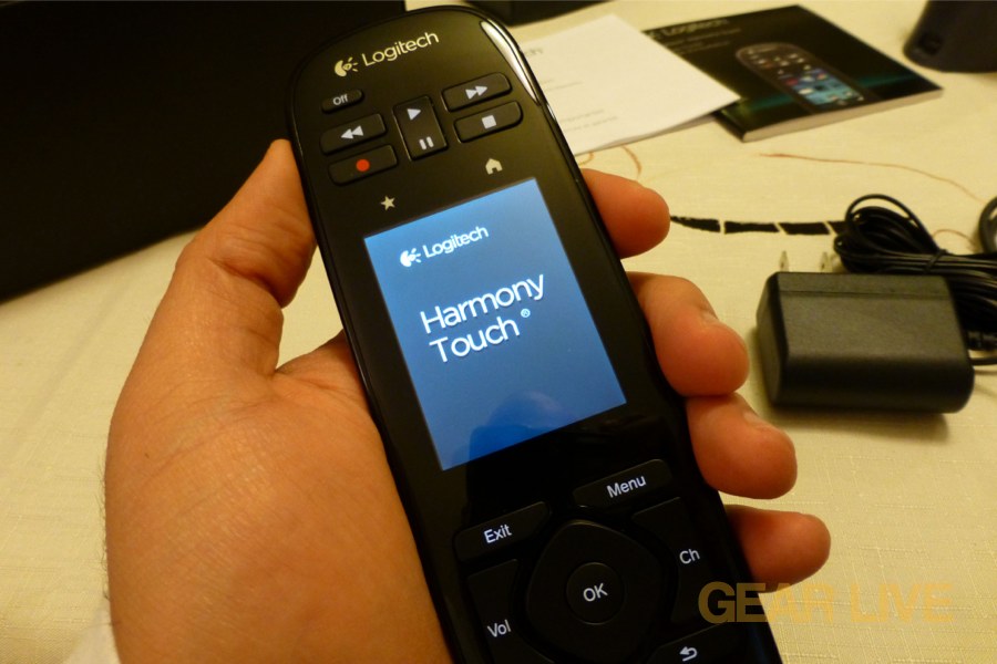 Logitech Harmony Touch powered on holding Logitech Harmony Touch powered on holding